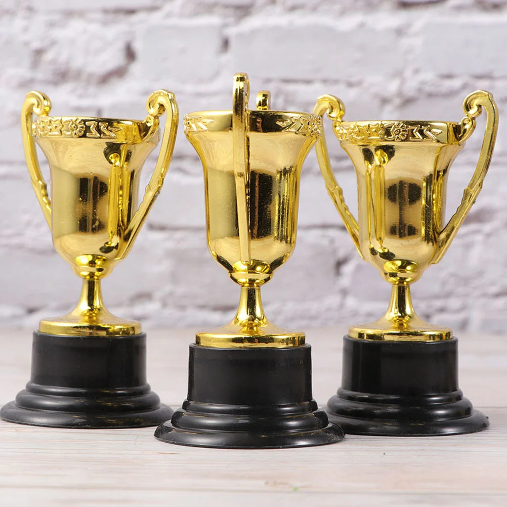 

Plastic Mini Trophy Cups Gold Award Soccer Trophies Competitions Prizes Classroom Rewards Ceremony Prize Party Favors