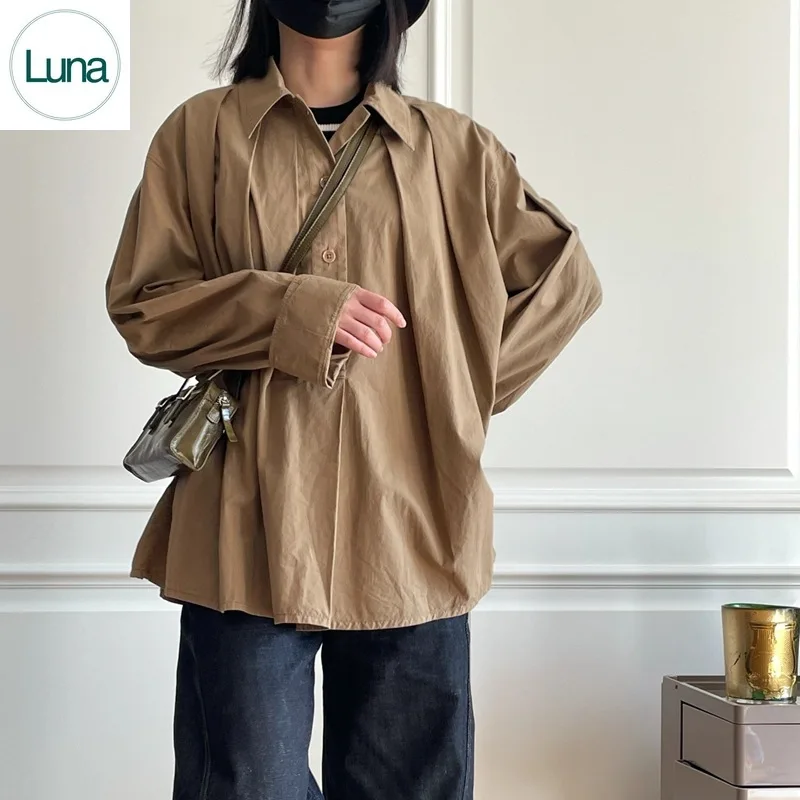 

niche French minimalist commuting loose silhouette lapels single-breasted long-sleeved shirt women's spring/summer 2023