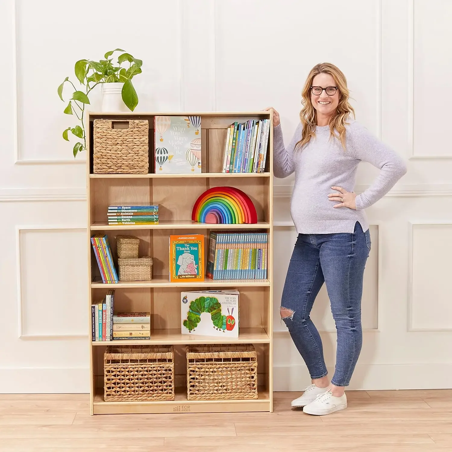 Natural wood bookshelf with adjustable shelves side view