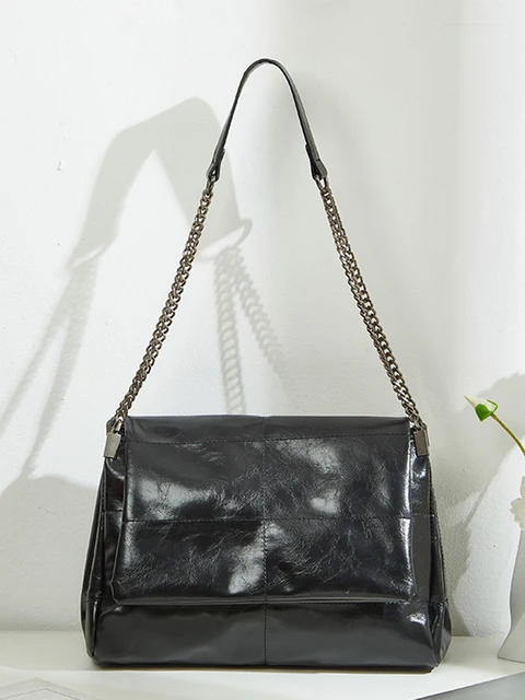 Sac de transport de grande capacité pour femmes, fourre-tout à chaîne, haut de gamme et à la mode, épaule simple sous les bras, nouvelle collection printemps/été 2024 1