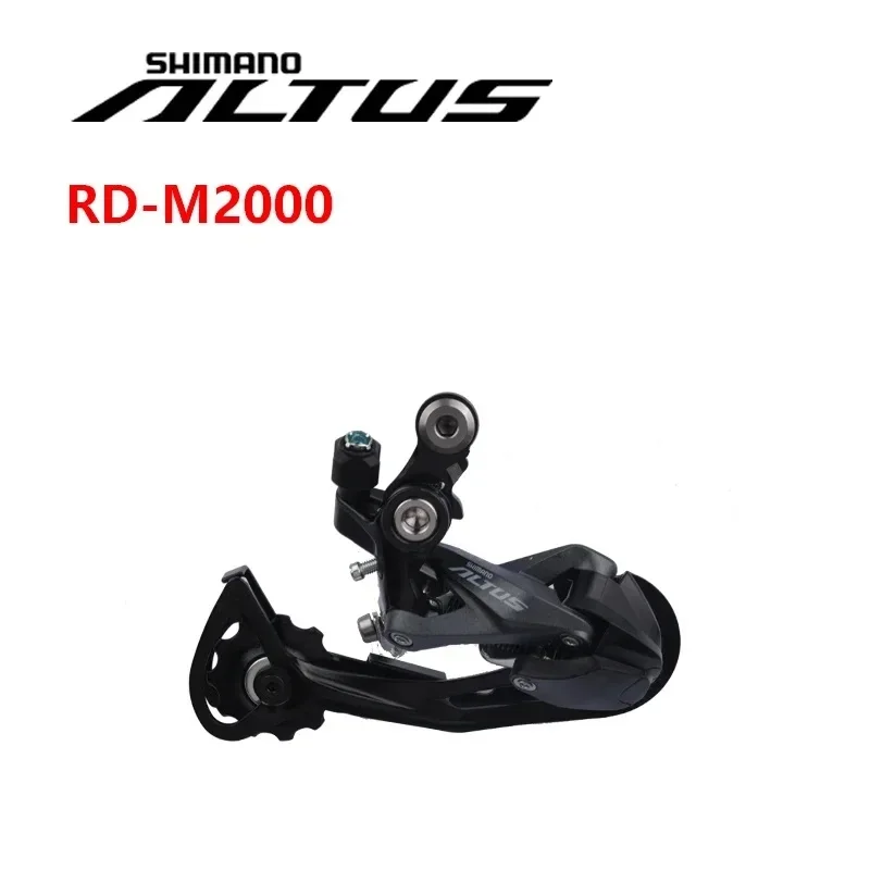 Dji S900 Deragliatore Posteriore Shimano Altus RD-M2000 SGS - 9 Velocità, Per Mountain Bike, Cage Lunga Deragliatore Posteriore MTB Dji S900 Deragliatore Posteriore Shimano Altus RD-M2000 SGS - 9 Velocità, Per Mountain Bike, Cage Lunga Deragliatore Posteriore MTB