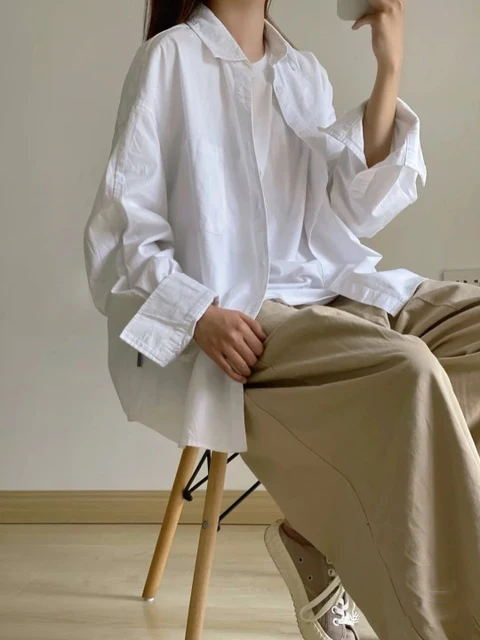 레트로 홍콩 맛 셔츠: 과거의 매력과 현대의 스타일이 만나는 세련됨