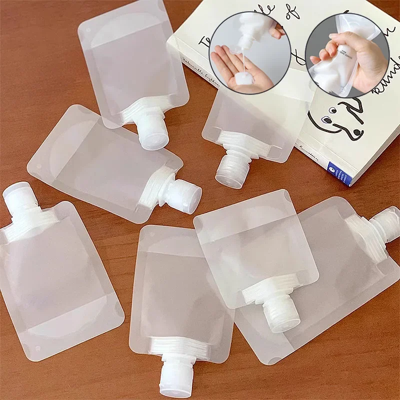 Set of 5 Refillable Travel Cosmetic Bottles and Pouches - Assorted Sizes