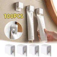 1-100PCS Pieces Toothpaste Holder No Punch Facial Wash Holder Bathroom Wall Mounted Multifunctional Toothpaste Holder 1