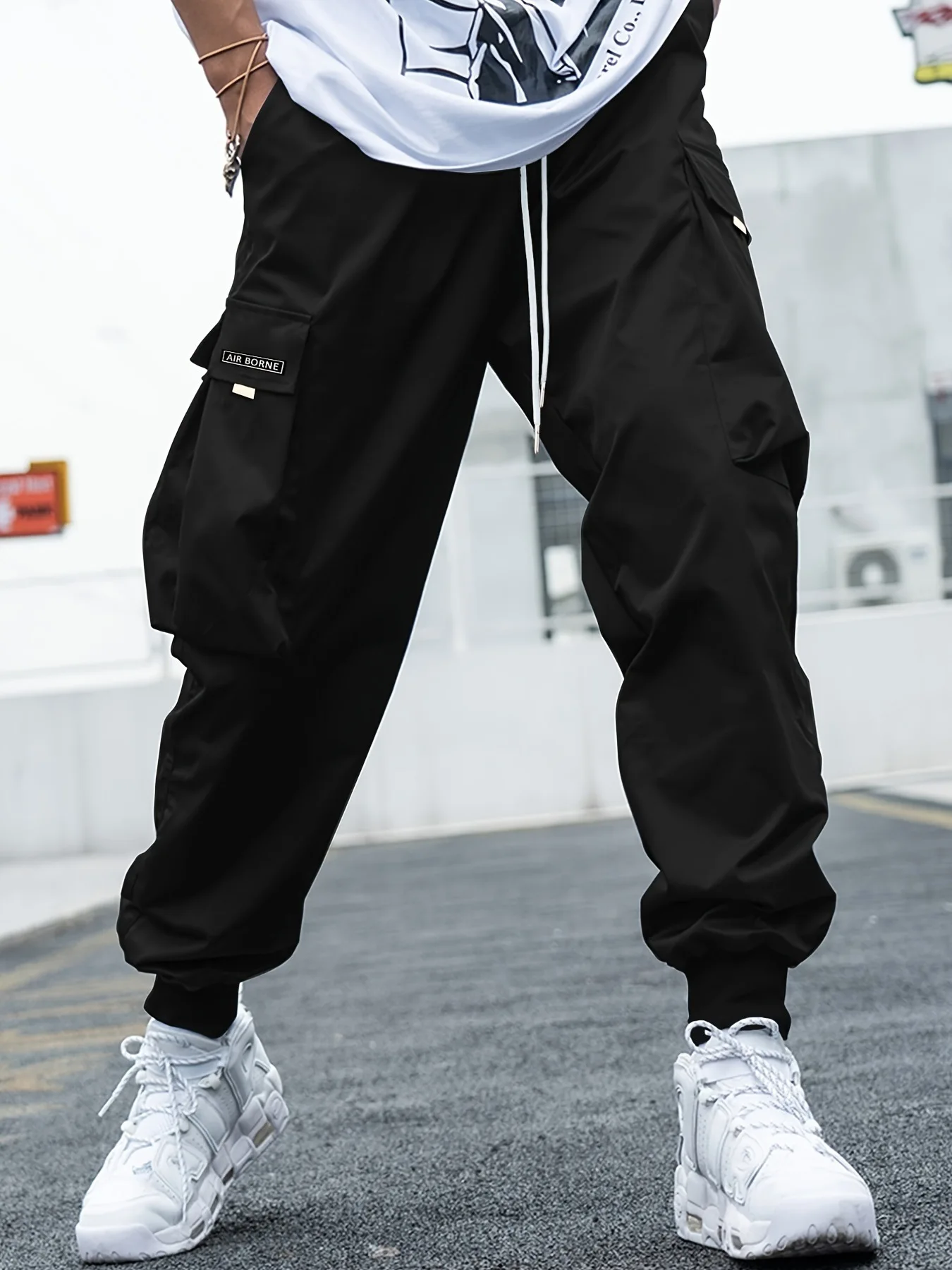 Men's new black multi-pocket pants with drawstring design hip-hop