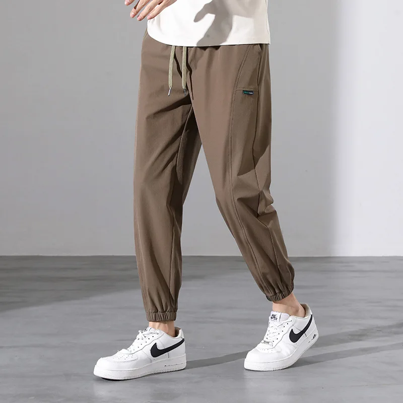 Spring and Autumn Men's Elastic High Waist Solid Pocket Drawstring Harlan Casual Sports Shrink Trousers Office Lady Pants