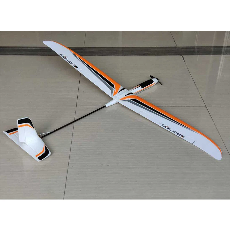 Le kit PNP du planeur RC U-GLIDER 300g, avec les composants électroniques visibles dans la boîte.