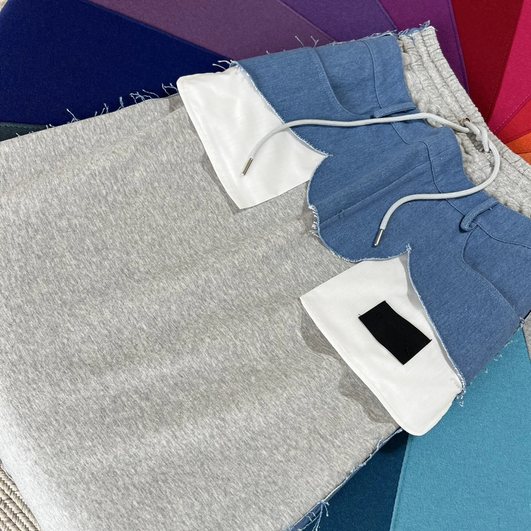 

2023 Hoodie fabric spliced denim hem half skirt