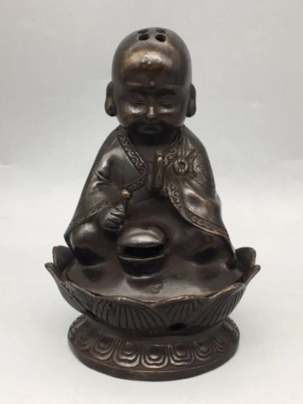 

Antique bronze collection, little monk incense burner, exquisite craftsmanship, mellow patina and complete shape.