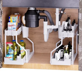 A 2-tier under sink organizer pulled out, showing neatly arranged cleaning supplies in a kitchen cabinet.