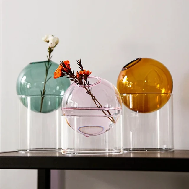 Sphere vase on a clear stand