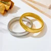 18K PVD Gold Plated Spring Antique Original Design Wide and Narrow Style Elastic  stainless Steel Bracelet Jewelry for women 3