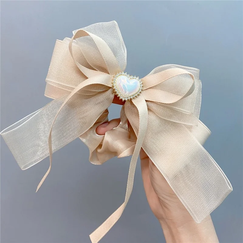 

Korean version of the sweet multi-layered mesh bow hair ring highlight pearl love organza long streamer large intestine ring