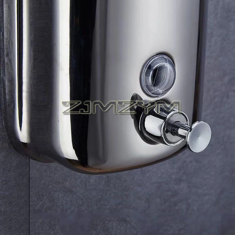Détail du réservoir et de la pompe du distributeur gel hydroalcoolique inox.
