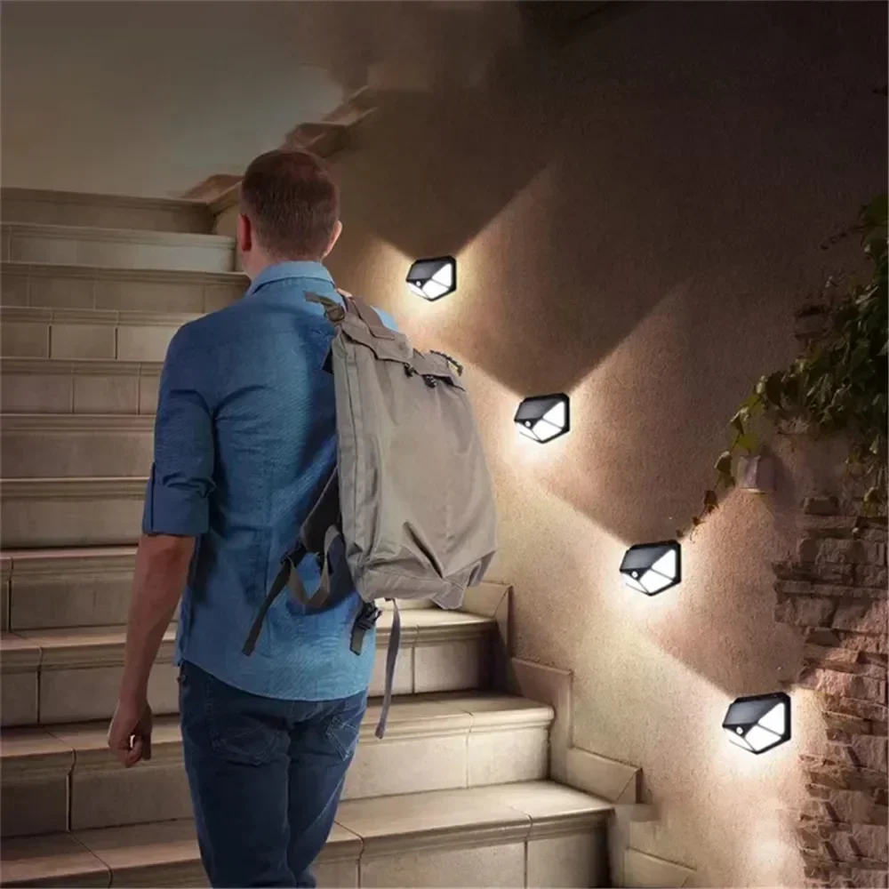 1/2/4pcs Solar Lights Outdoor 100 LED Solar Sensor Motion Light 3 Modes Outdoor Wireless Lamp Wall Lights