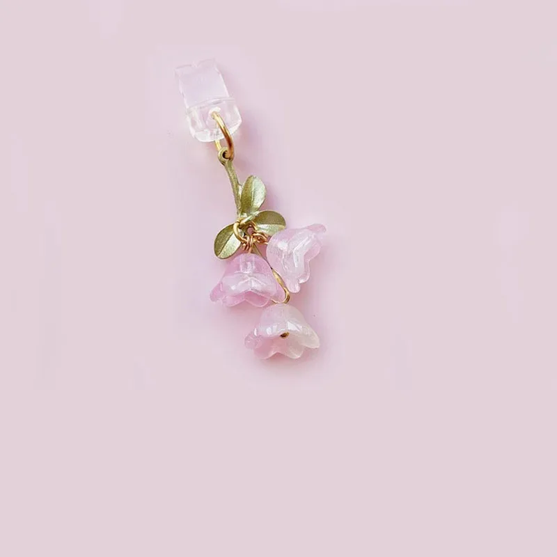 Charming Pink Lily of the Valley Phone Accessory with Green Leaf Accent