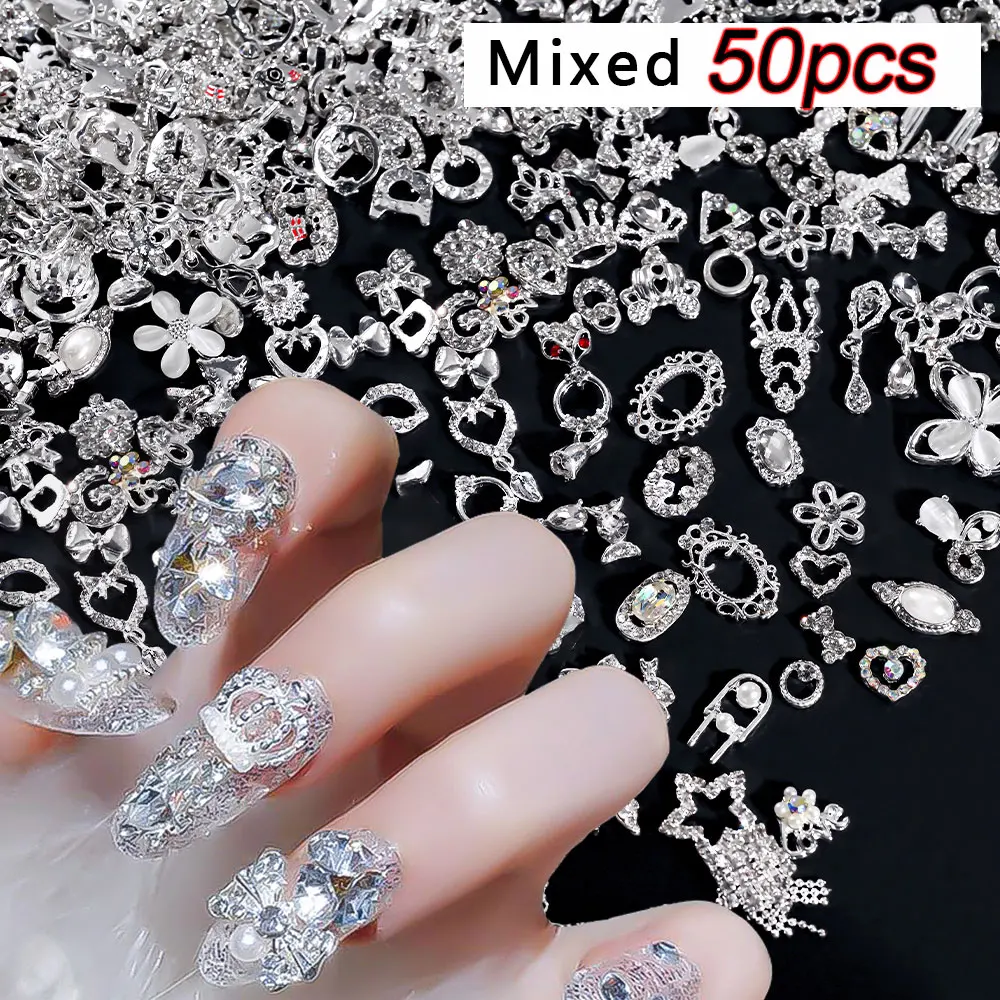 50pcs 혼합 스타일 실버 네일 장식품 3D Aolly 하트/나비/꽃/스타 네일 라..