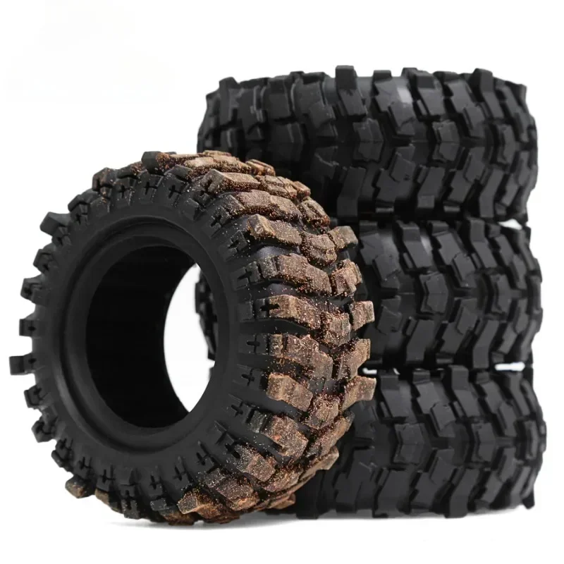Gros plan sur un pneu crawler RC 1.9 88x36mm montrant la sculpture profonde pour une adhérence maximale en tout-terrain.