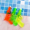 1 PCS 2023 Novelty Rubber Band Hand Pull Dong Dong Punch Empty Gun Gifts Punch Paper Ball Gun Christmas Toys For Children Funny 2