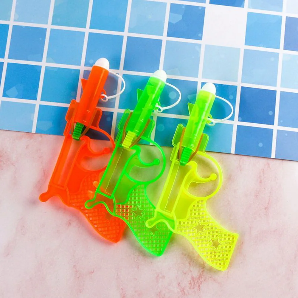 1 PCS 2023 Novelty Rubber Band Hand Pull Dong Dong Punch Empty Gun Toys Punch Paper Ball Gun With 50 PCS Of Soft Rubber Bullets 2