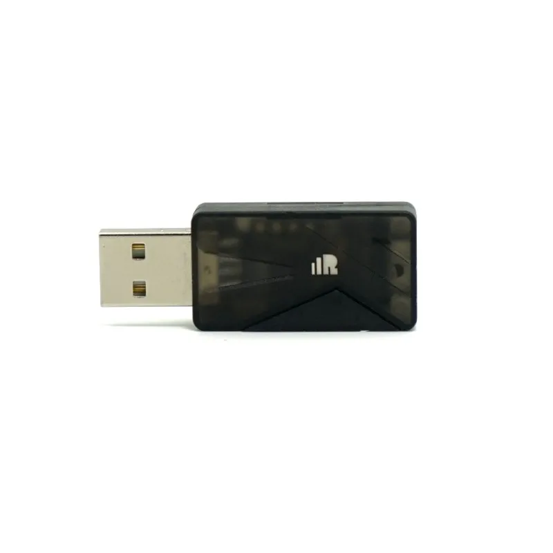 Dongle USB FrSky XSR-SIM branché sur un ordinateur portable, prêt à simuler