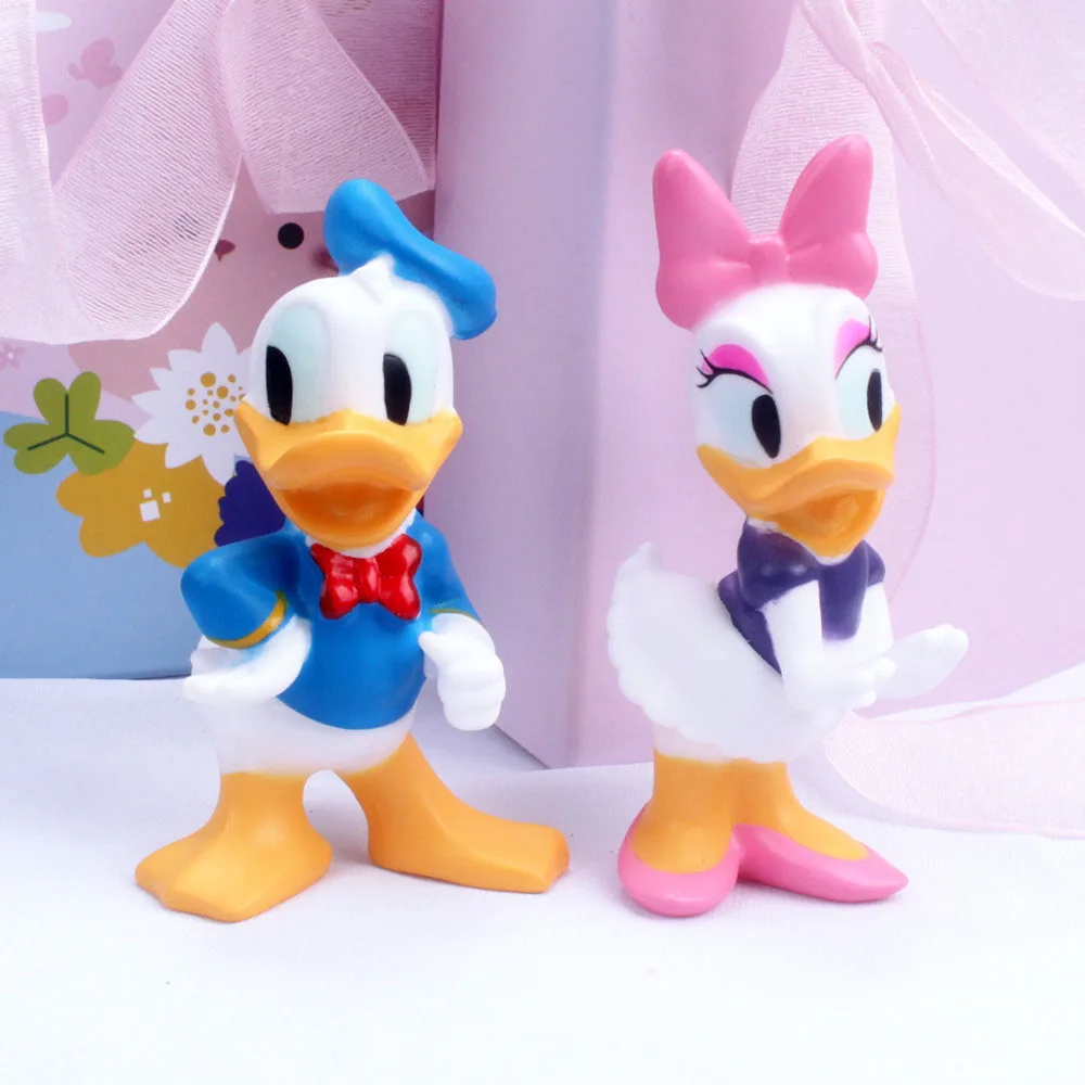 

11cm Disney Kawaii Donald Duck Cake Decoration Action Figure Pvc Lovely Model GK Toys Kids Birthday Festival Gifts Decoration