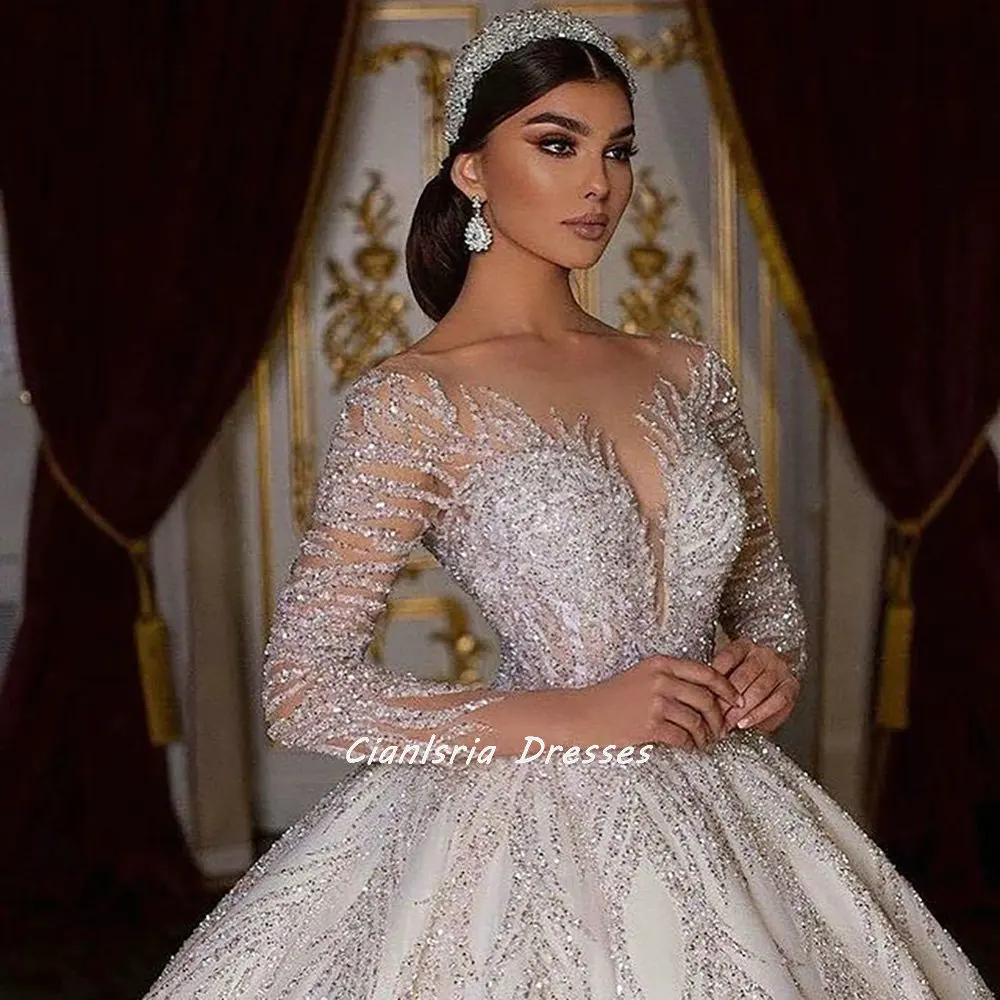 Exquisite Deep V-Neck Long Sleeve Dubai Ball Gown Wedding Dress Sparkly Crystal Appliques Backless Saudi Arabic Bridal Gown 1