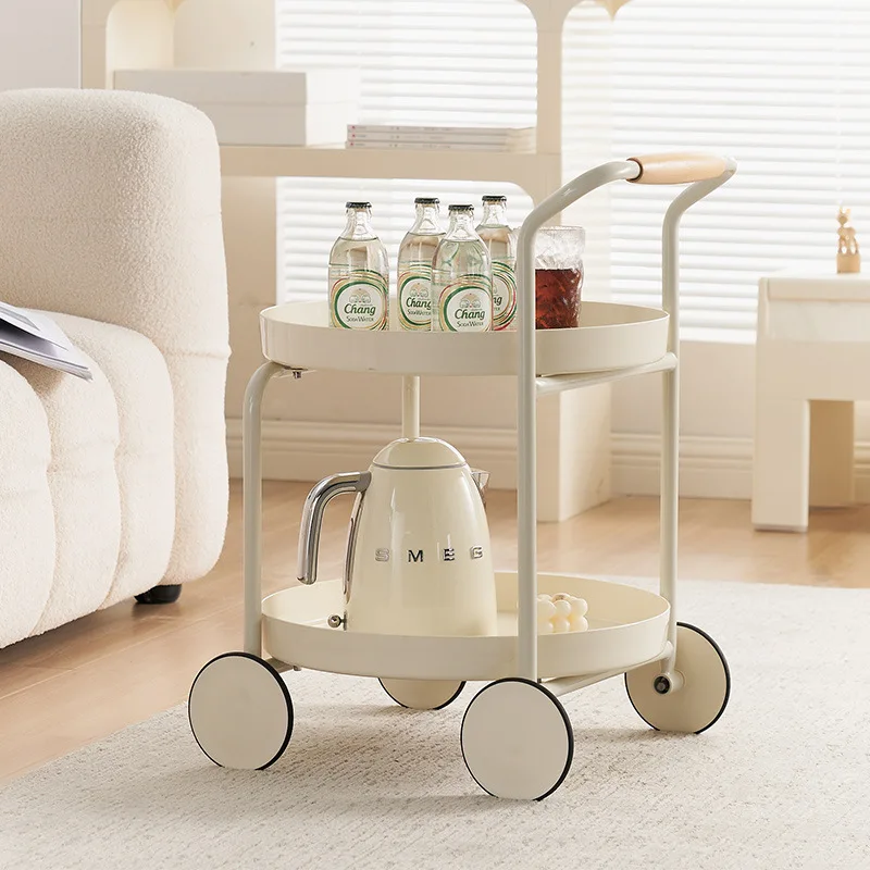 

Several small-sized coffee table storage racks for coffee tables beside the Nordic sofa with a living room cream trolley.