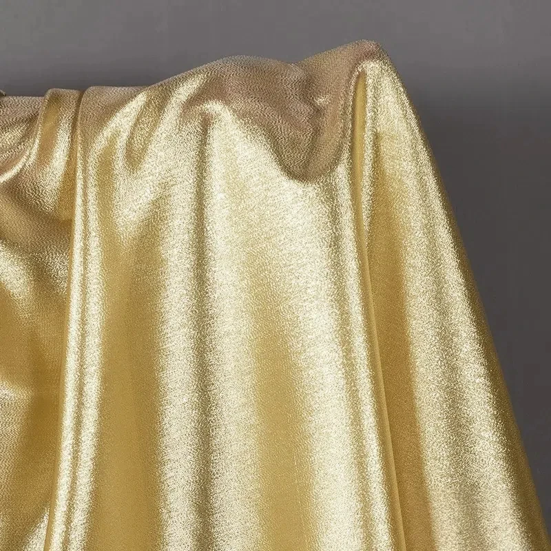 Radiant Golden Silk-Blend Reflective Stage Wear Fabric