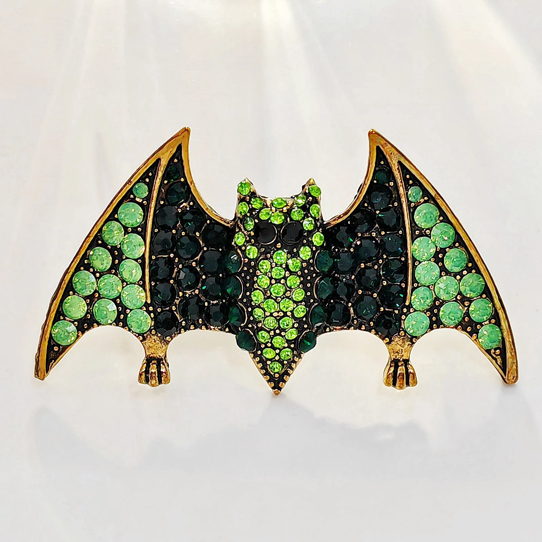 

Spooky Vintage Green Rhinestone Halloween Bat Brooch Pin