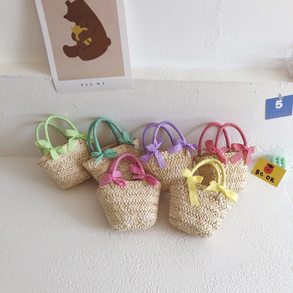 

Korean Style Children's Handbag Sweet With Bowknot Small Basket Beach Bag Straw Woven Handmade Outting Bags Kids