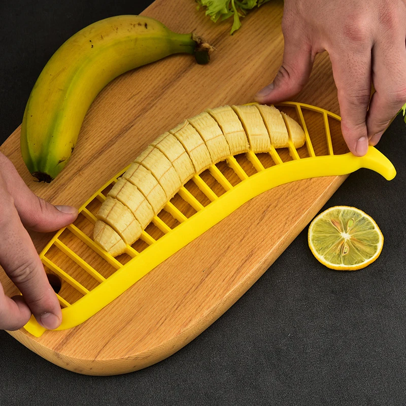 https://ae01.alicdn.com/kf/S69dddc3d01b74a8bbcf7adfb34cda83bs/Creative-Kitchen-Gadgets-PP-Banana-Divider-Slicer-Fruit-Salad-Slitter-Banana-Slicer-Kitchen-Gadgets-And-Accessories.jpg