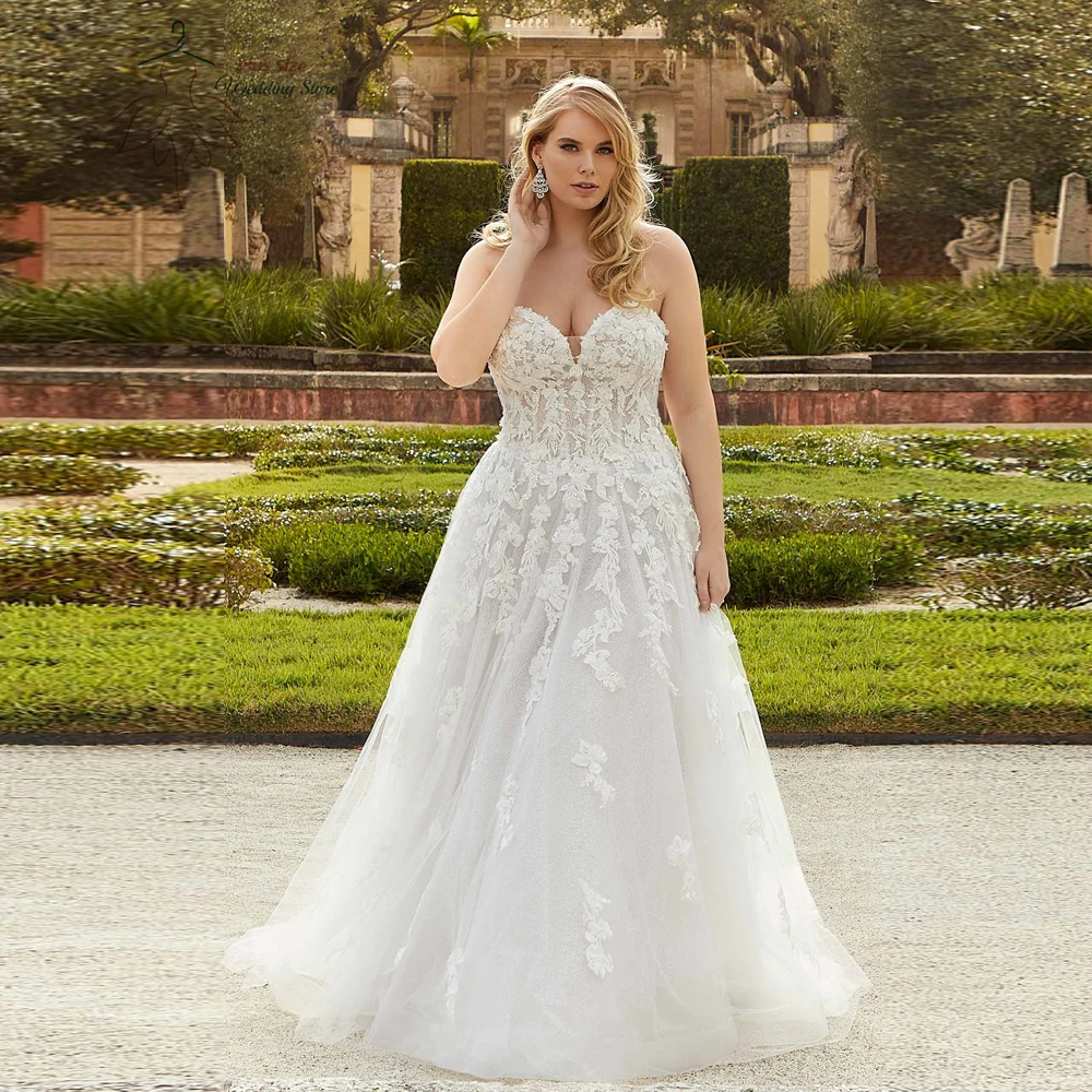 

Elegant Wedding Dresses Plus Size Sweetheart Neck Sleeveless Bride Gowns Appliques Sweep Train A-Line Tulle Robe De Mariée 2023