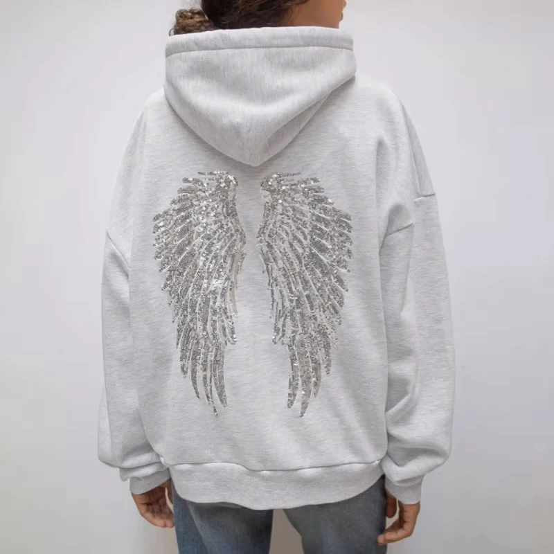 รูปสินค้า ชุดเซ็ตเสื้อฮู้ดลายปีกวินเทจ กางเกงขายาว ซิปหน้า สตรีทแฟชั่น