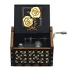Hand-cranked music box, retro engraving, exquisite painting, attacking giants, the same creative ornament, wooden music box 6