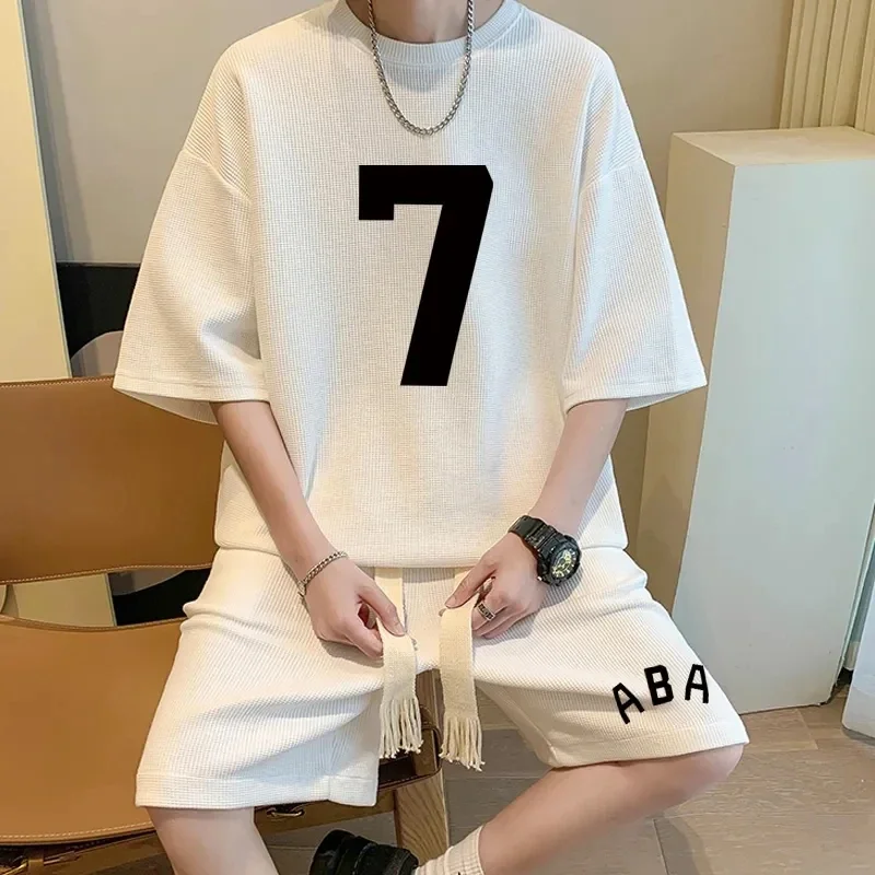 thumbnail image 1 of Conjunto de moda coreana para hombre, con estampado de gofres, camiseta de manga corta y pantalones cortos, conjunto deportivo de 2 piezas, chándal de moda de verano, 1 of 5