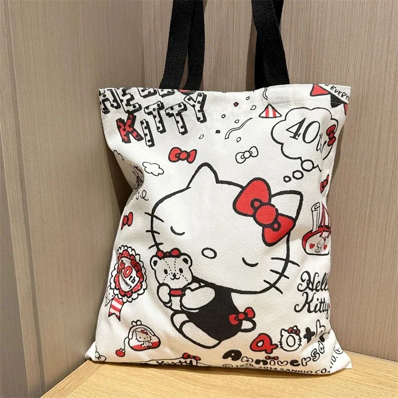 

Sanrio Hello Kitty Handbag Cute Cartoon Portable High-capacity Fashion Shopping Student Book Canvas Storage Bag Holiday Gifts
