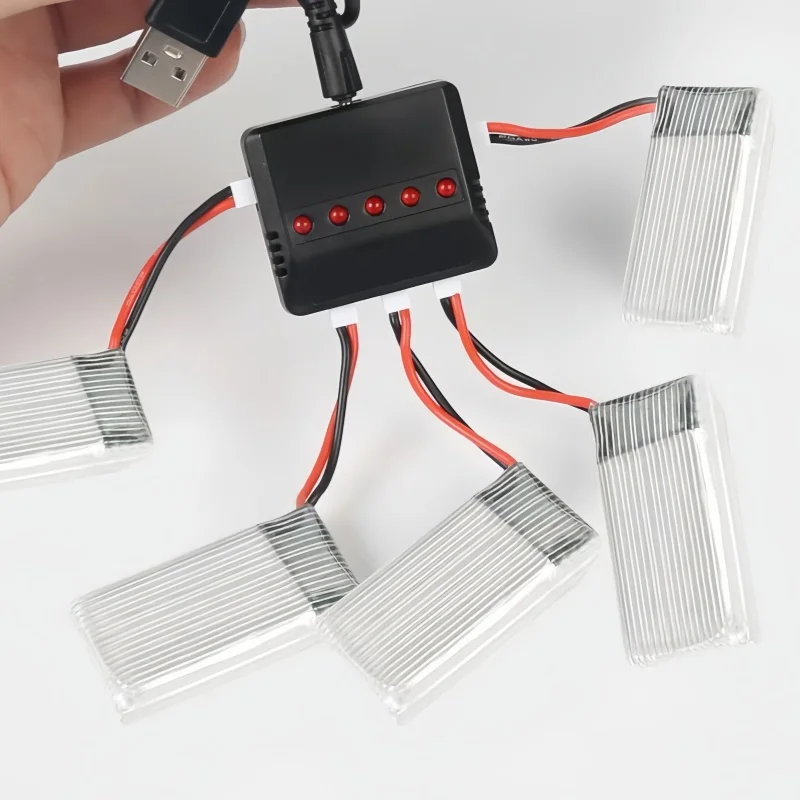 3,7 V Lithium-Batterieladegerät, USB, kleiner weißer Kopf, 1 Drag, 4-Stecker zum Aufladen von Drohnen-Lithium-Batterien, Spielzeug-Batterieladegerät – Detail 7