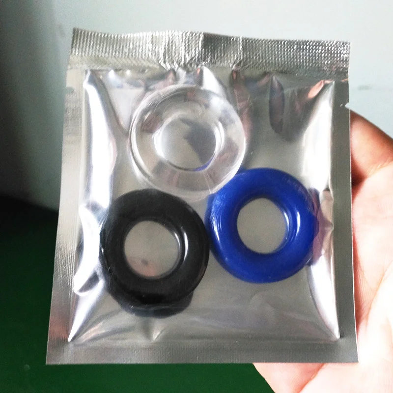Anello tricolore con bloccaggio dell'essenza Anello solare per uomo con perlina Anello con bloccaggio dell'essenza Anello preservativo sessuale Anello solare in silicone Anello fallico trasparente_voghion.com