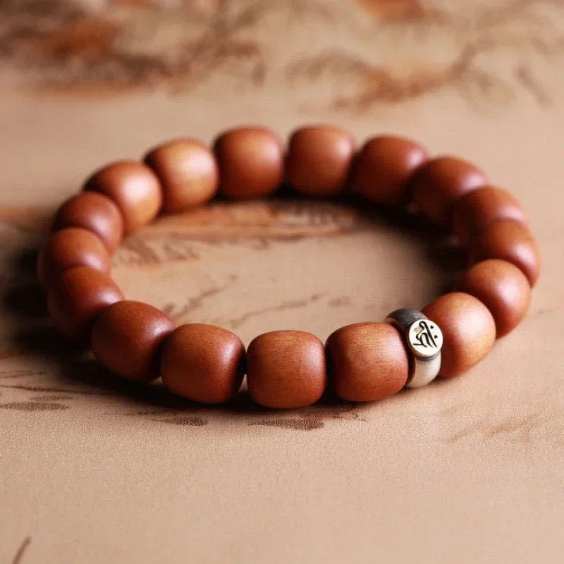 

India Laoshan 12mm Barrel Bead Black Red Meat Submerged Sandalwood Bracelet Wholesale