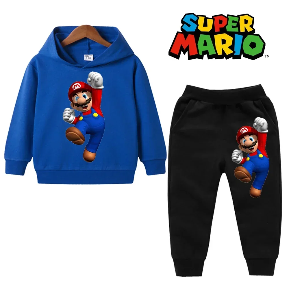 Child wearing a Mario Bros and Pokémon-themed hoodie and matching pants, smiling outdoors in a playful spring setting blue black
