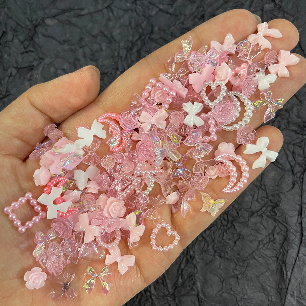 50Pcs 진주 핑크 Bowknot 하트 모양의 라인 석 혼합 네일 장식 Kawaii 꽃 나비 매력 DIY 네일 액세서리