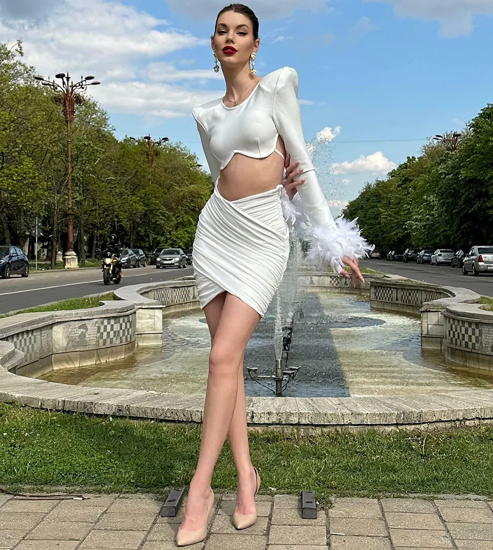

Long Sleeve Feather Elastic Bandage Set In White Black Women Party Outfits Crop Top And Ruched Strappy Skirt Two Piece Set