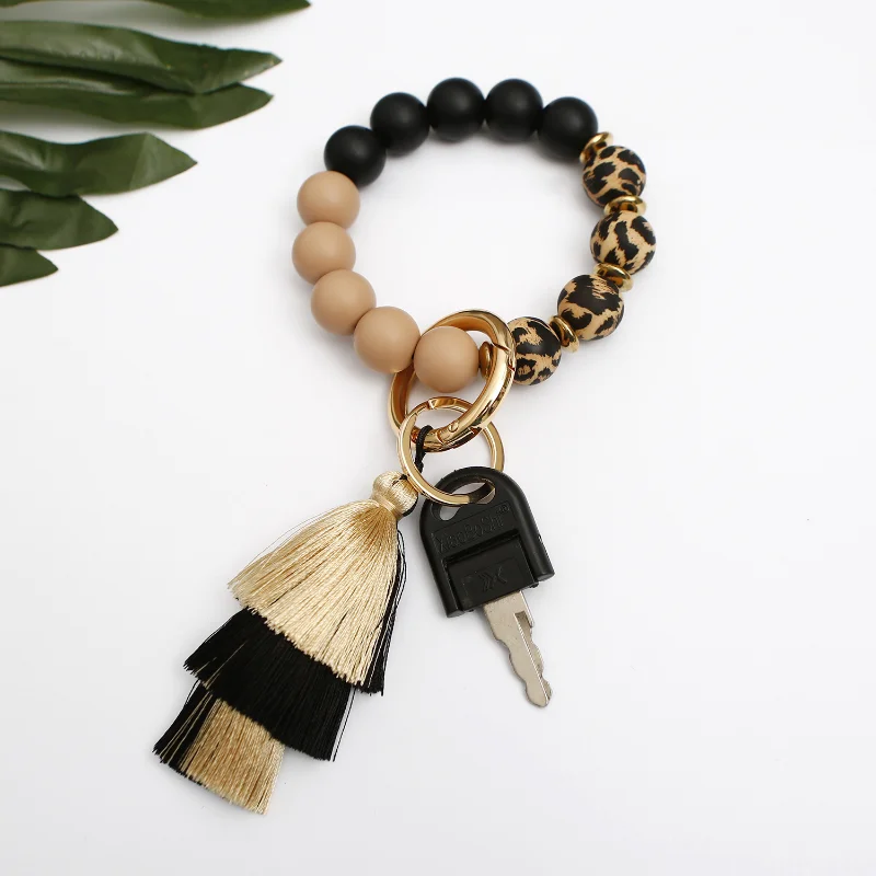 

Wholesale Cow Zebra Leopard Print Silicone Bracelet Keychain High-quality Sense Human Silk Tassel Handmade Wrist Keyring