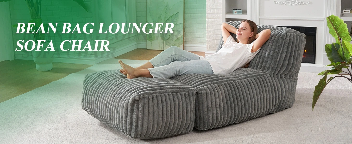 Lying on our grey bean bag lounger sofa