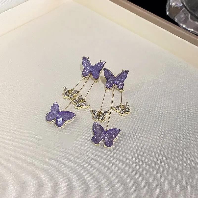 Orecchini pendenti in argento con farfalle e zirconi