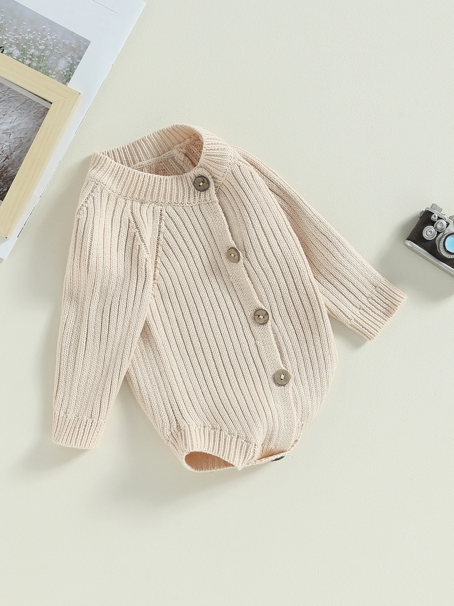 

Baby Girl Knitted Jumpsuit with Long Sleeves and Round Neckline - Adorable Solid Color Ribbed Romper for Fall Season Outfit