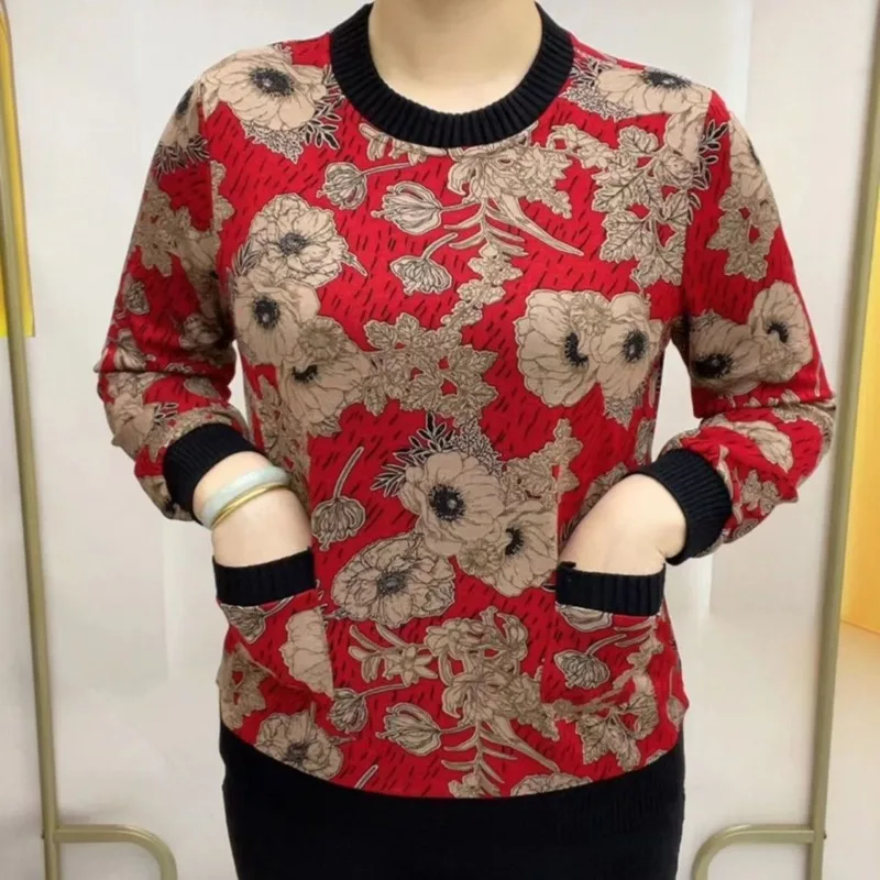 

2023 Autumn and Winter New Women's Fashion Round Neck Patchwork Pockets Printed Long Sleeved Casual Loose Pullover Bottom Tops