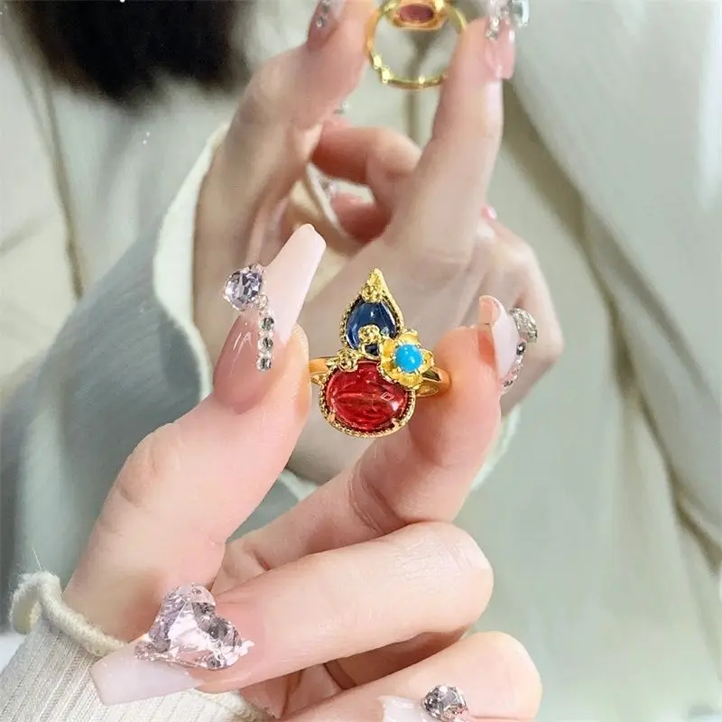 

Женское кольцо в этническом стиле с имитацией разноцветных драгоценных камней