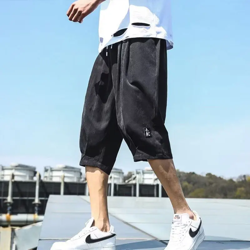 Elegant Fashion Harajuku Slim Fit Male Clothes Loose Ice Shreds Casual Harlan Pants Solid Pockets Sport All Match Cropped Pants